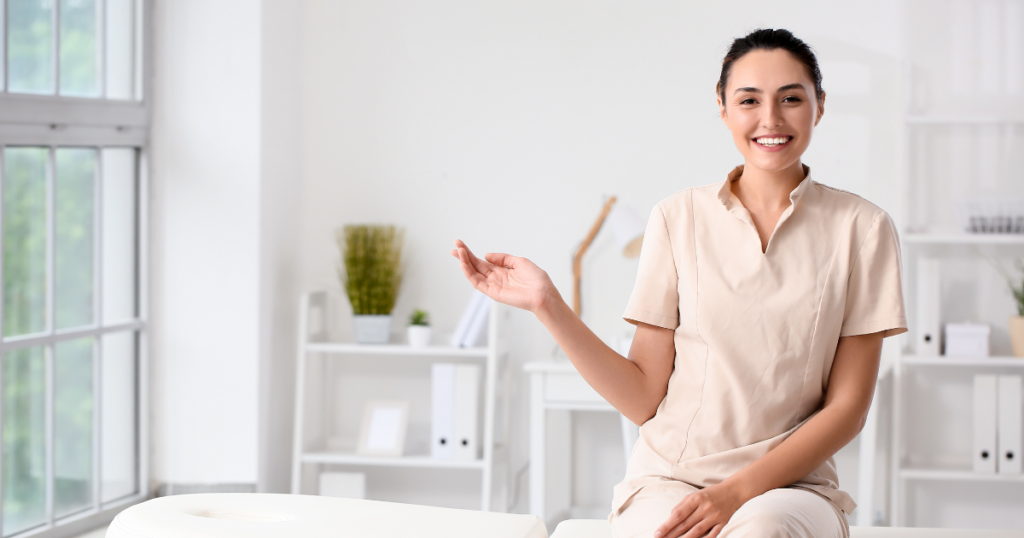 chiropractor welcomes patients to her clinic