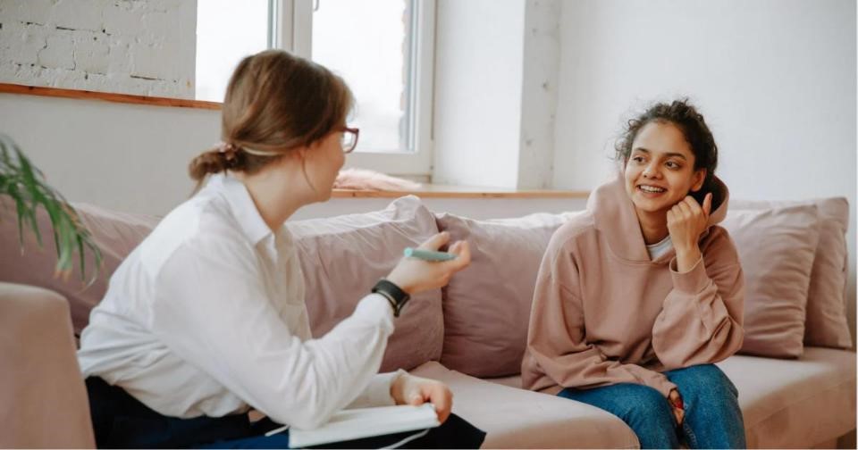 Illustration of a person receiving mental health therapy from a professional.